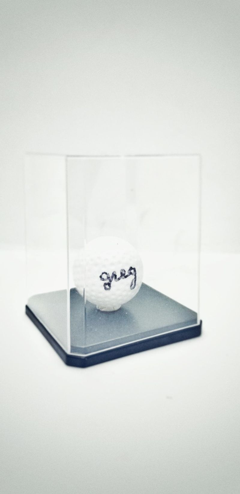 official "bootleg greg" golf ball signed by "greg"