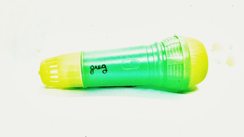 official "bootleg greg" plastic novelty "echo microphone" signed by "greg"